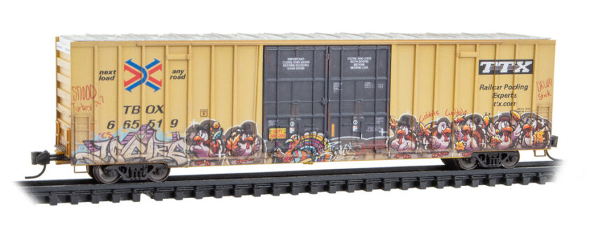 Micro Trains 12344018   N 60' Rib Side, Double Plug Door High-Cube, TTX #665519 weathered